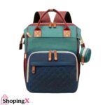 Large multicolor baby diaper backpack with quilted front and bottle pouch